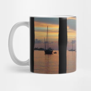 Sailboats anchored at sunset Mug